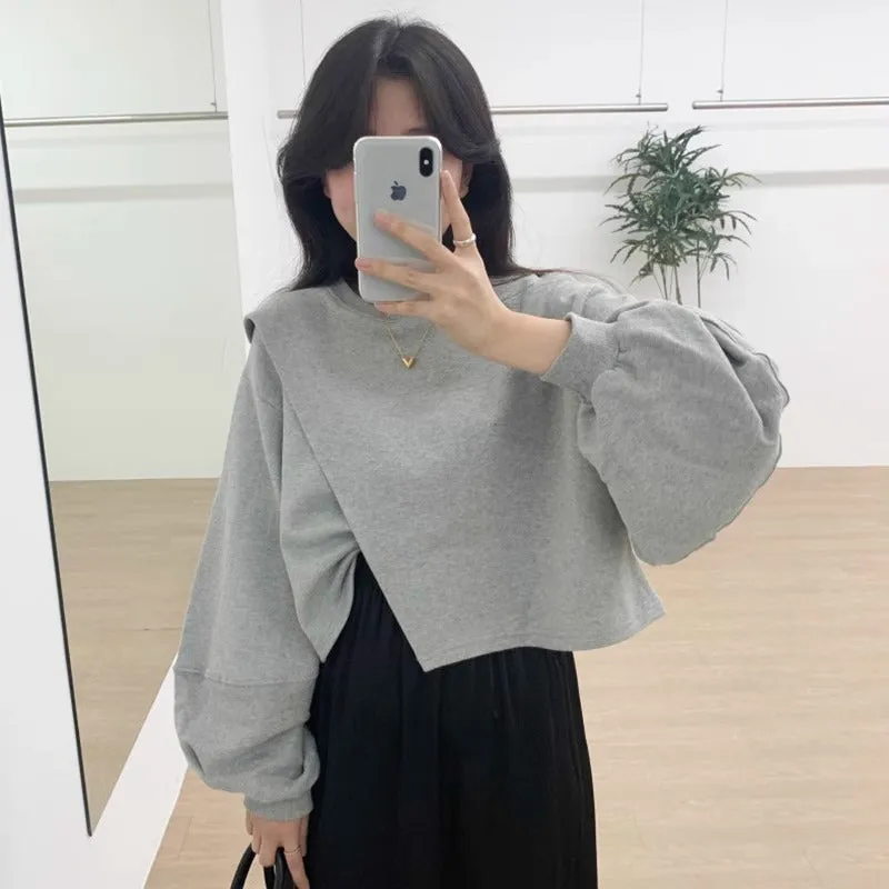 METAVERSMALL Korean chic autumn niche design sense pullover round neck irregular split fork loose versatile long-sleeved short sweater