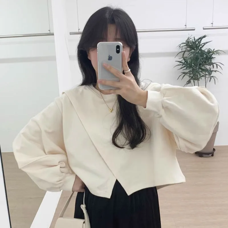 METAVERSMALL Korean chic autumn niche design sense pullover round neck irregular split fork loose versatile long-sleeved short sweater